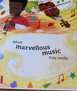 You can see some of the other children in the band playing their instruments with the words “What marvellous music they made.” On the page. Colours, musical notes and stars swirl around these children and the words on the page.