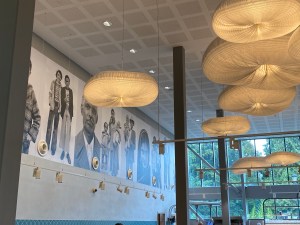 Black and white portraits on the wall in Kiln Café. You can also see the rather lovely, oversized lighting from the café.