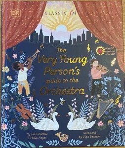 The bright, colorful front cover of the book showing our 2 protagonists Jayden, the trumpeter, and Ava, the violinist, performing on stage surrounded by other elements of the book-including 2 swans!