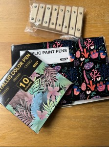 The wooden xylophone kit together with 2 packs of acrylic paint pens that we used for this task - one is a general pack of acrylic paint pens, and one is a pack of 10 metallic colour paint pens.